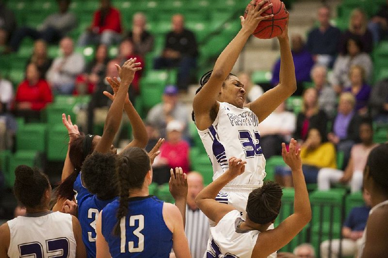 Fayetteville’s Jasmine Franklin pulls down a rebound in front of three Conway defenders Friday during the Bulldogs’ 63-45 victory over the Wampus Cats at the Class 7A girls state basketball tournament in Van Buren. 