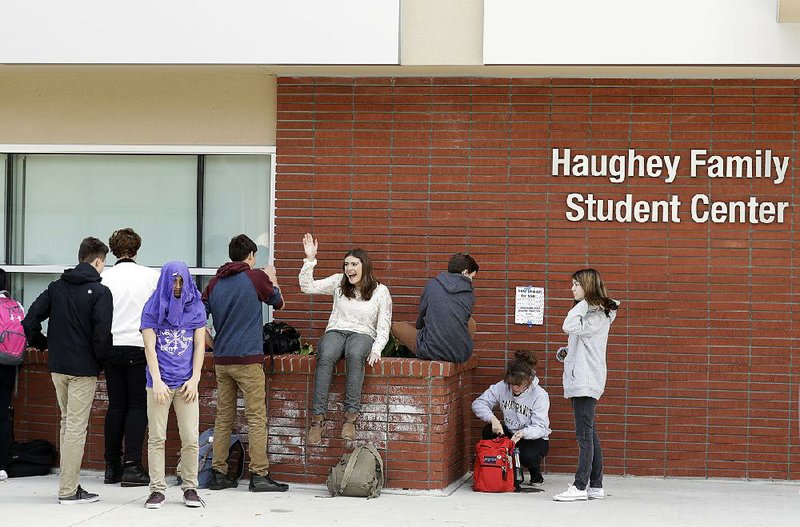Students gather Friday at St. Francis High School in Mountain View, Calif. A parent at the private school talked its board into investing in Snap Inc. in 2012.