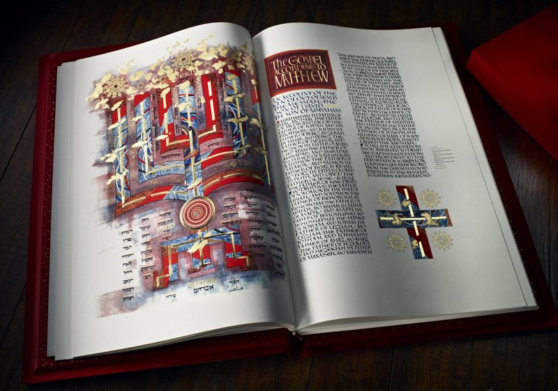 The St. John’s Bible Heritage Edition, a copy of the original, is open to the Gospel of Matthew. 