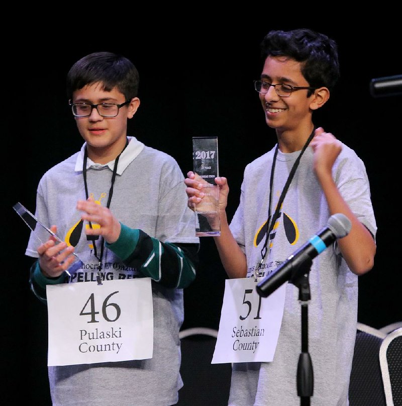 Haris Rana (right), an eighth-grader at Fort Smith’s Chaffin Junior High School, and Pulaski Academy seventh-grader Parray Faizan were the top two finishers in Saturday’s spelling bee. Rana now advances to the national competition. 