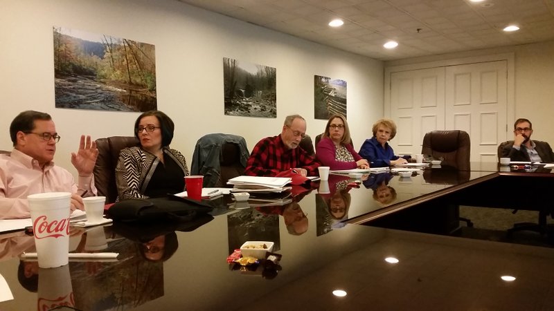 Alderman Mark Kinion, left, speaks during a strategic planning session held Saturday, March 4, 2017, at the Pratt Place Inn and Barn in downtown Fayetteville as his fellow council members Sarah Marsh, Mayor Lioneld Jordan, Sarah Bunch, Adella Gray and Matthew Petty listen and take notes.