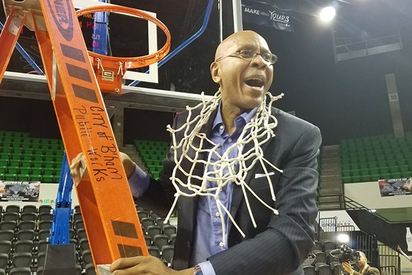 Clark Atlanta coach Darrell Walker celebrates after winning the SIAC Basketball Tournament on Saturday, March 4, 2017, in Birmingham, Ala. 