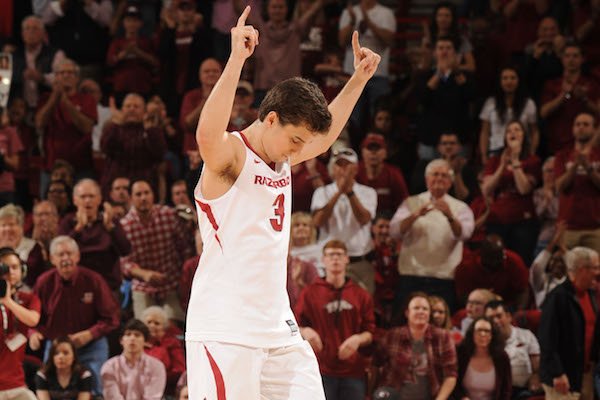 Arkansas guard Dusty Hannahs celebrates in the closing seconds against Georgia Saturday, March 4, 2017, during the second half of play in Bud Walton Arena in Fayetteville.