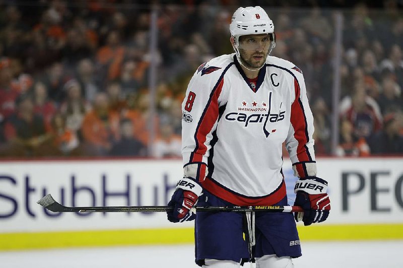 Washington Capitals left winger Alex Ovechkin surprised several customers when he delivered pizzas to them
in his role as a spokesman for Papa John’s Pizza.