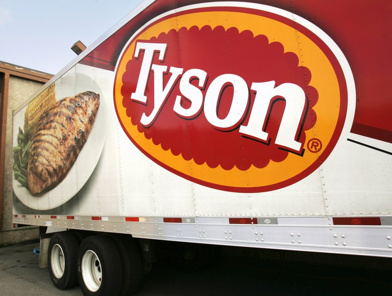 FILE - In this Wednesday, Oct. 28, 2009, file photo, a Tyson Foods, Inc., truck is parked at a food warehouse in Little Rock.