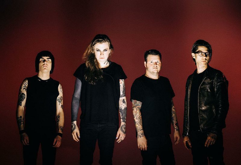 Laura Jane Grace (second from left) and Against Me! will open for Green Day on Wednesday at Verizon Arena.