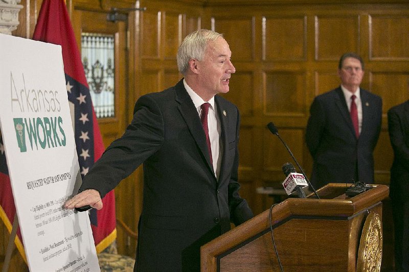 Gov. Asa Hutchinson on Monday details changes he’s seeking from the federal government for the Arkansas Works program, which uses Medicaid funds to buy private insurance for low-income residents. More than 300,000 people are enrolled in the program that was created under the existing federal health law.