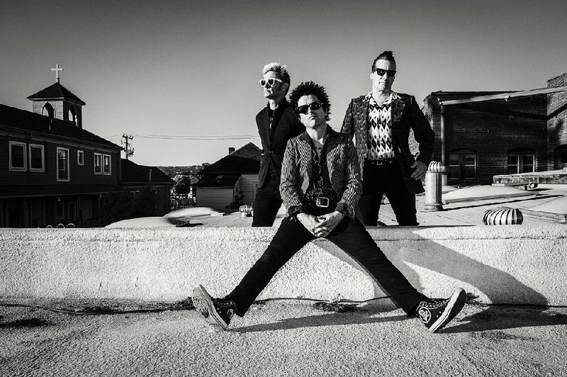 Green Day members (from left) are Mike Dirnt, Billie Joe Armstrong and Tre Cool.