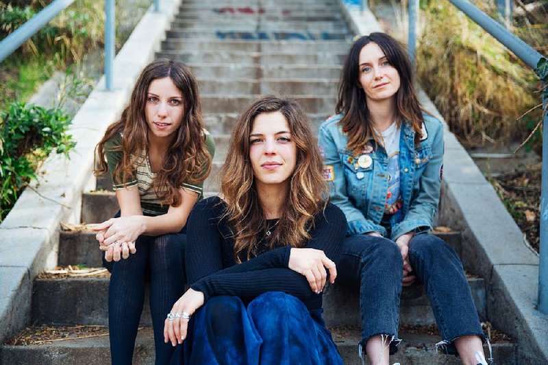 Wild Reeds members Sharon Silva (from left), Kinsey Lee and Mackenzie Howe — bring their striking harmonies and folk-tinged rock to Stickyz Rock ’n’ Roll Chicken Shack on Wednesday.