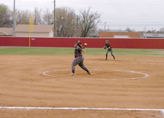 Mark Humphrey/Enterprise-Leader Siloam Springs freshman Rachel Mann throws a pitch against Farmington during Monday&#8217;s game in Farmington.