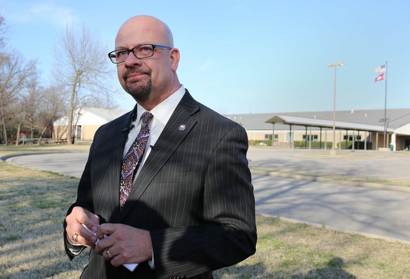 Matthew Wendt, superintendent of Fayetteville Public Schools, pauses during an emotional moment Wednesday at Vandergriff Elementary School as he speaks about the death of a student who was found unresponsive in a nearby swimming pool on Tuesday. The pool was on private property adjacent to the school.