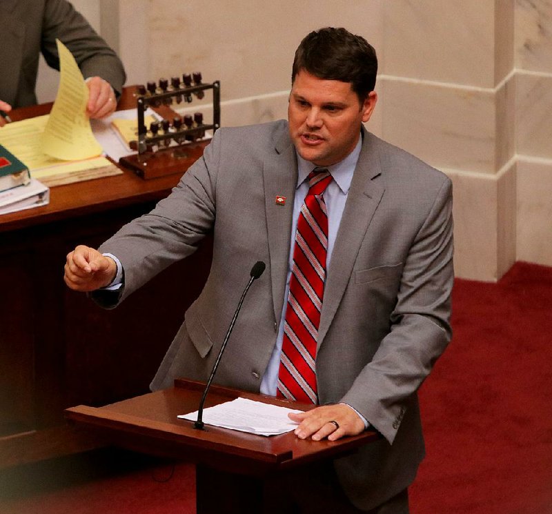 Sen. Bart Hester speaks in favor of the bill to allow grocery stores to sell any kind of wine before the measure was approved Wednesday in the Senate chamber on a 18-14 vote.