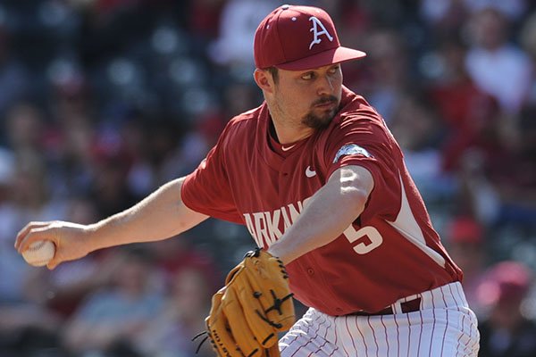 Arkansas reliever Cody Scroggins delivers to the plate against Miami (Ohio) Saturday, Feb. 18, 2017, during the ninth inning at Baum Stadium in Fayetteville. 