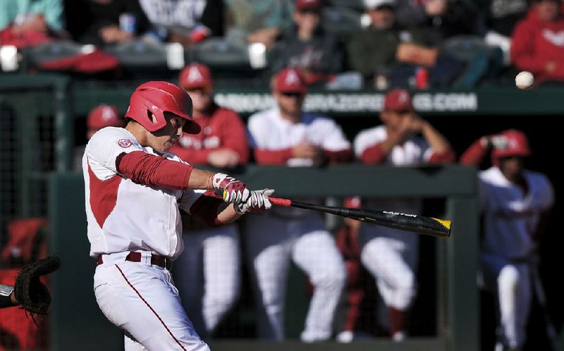 Arkansas center fielder Dominic Fletcher hit a home run in the bottom of the second inning Friday asthe Razorbacks defeated Rhode Island 5-2 in the fi rst game of a doubleheader at Baum Stadium in Fayetteville. The Razorbacks won the second game 3-2 to complete the sweep.