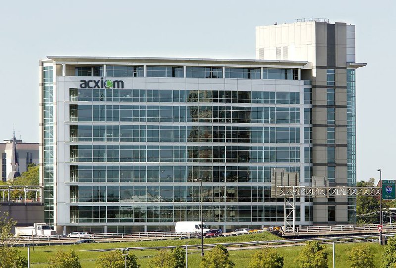 The Acxiom Corp. building in the Little Rock River Market District, which opened in 2003, has been purchased by Simmons Bank of Pine Bluff for $25 million, officials announced Friday.