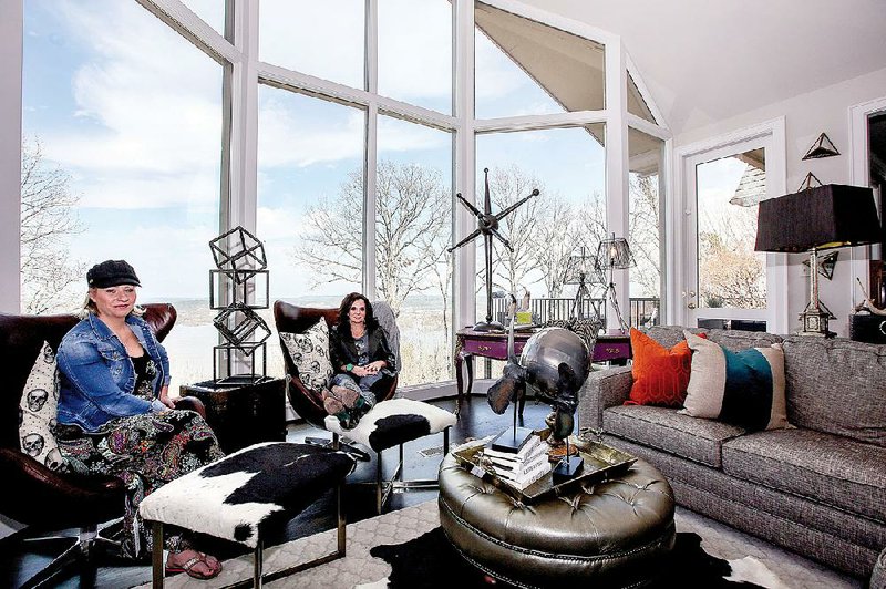 Home-decor choices among millennials is all about eclecticism — eclecticism buoyed by purchases from Ikea, flea markets and garage sales, and quirky do-it-yourself projects that involve refurbishing and re-purposing. Little Rock decorator Ashley Engstrom (right) and her design partner, Melissa Stickford, sit in Engstrom’s living room, appointed with items, some from Little Rock store Urban Pad, that reflect millennial tastes.