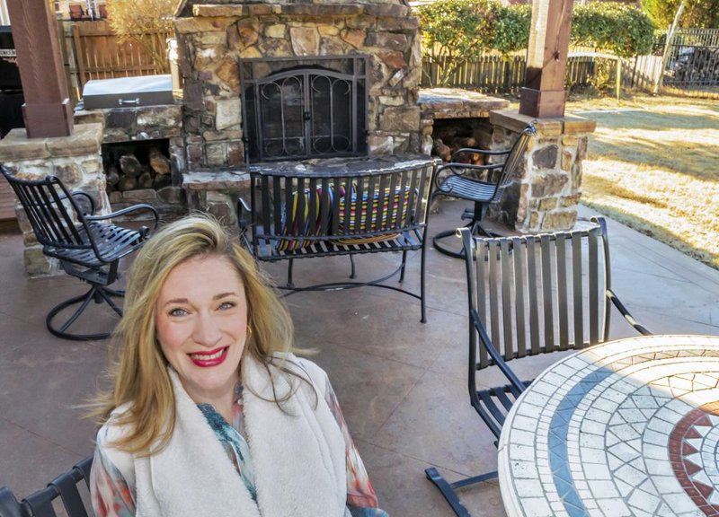 Heather Abed in her favorite space, her patio. 