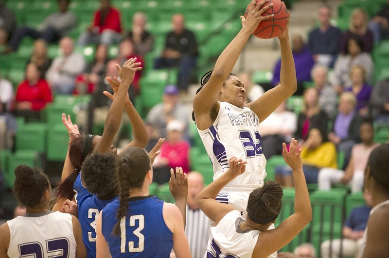 Fayetteville’s Jasmine Franklin (32) comes down with a rebound March 3 during the 7A State Basketball Tournament in Van Buren.