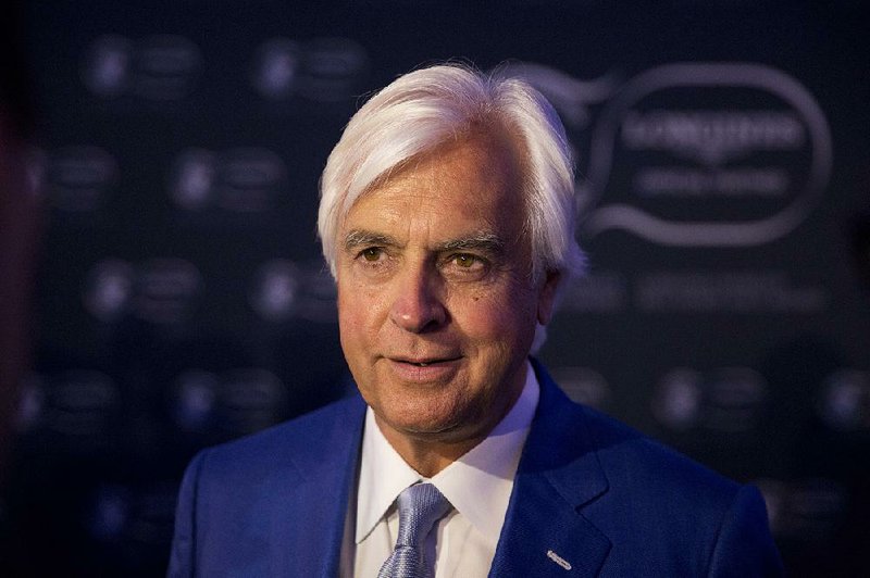 In this Jan. 19, 2016, file photo, Bob Baffert, the American trainer of the race horse American Pharoah, speaks during an interview with The Associated Press after receiving the Longines World's Best Racehorse award for American Pharaoh's achievements in 2015 at an award ceremony at Claridge's hotel in London.