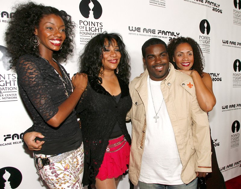 This Aug. 14, 2006 file photo shows Joni Sledge, one of the original members of "Sister Sledge" second from left, posing with Rodney Jerkins, second from right, her niece Camille Sledge, left, and her cousin Amber Sledge at the "We Are Family 2006 - All-Star Katrina Benefit CD and Documentary DVD Launch" in Century City, Calif. 