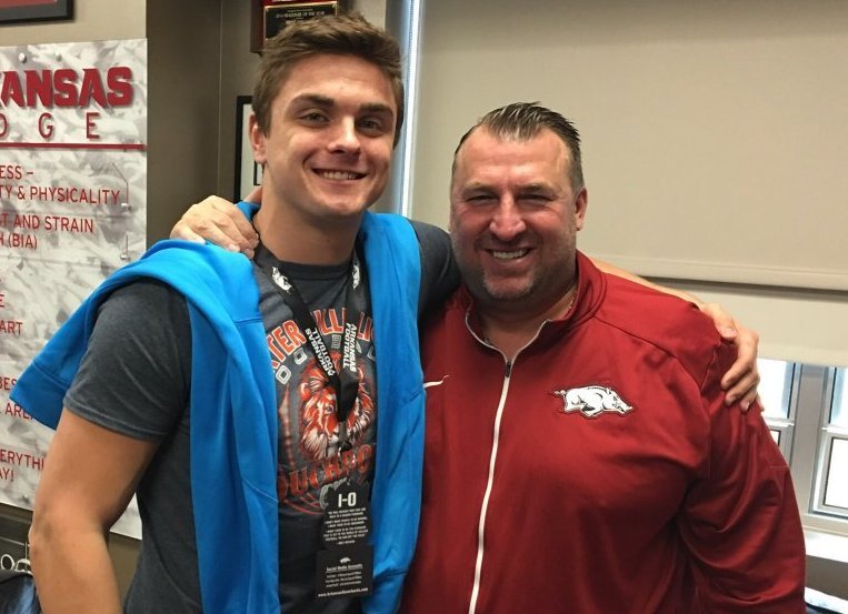 Hog tight end commitment Luke Ford and Coach Bret Bielema. 