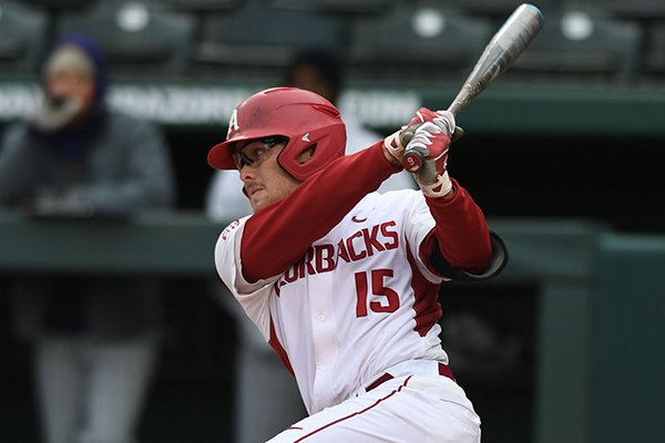 Arkansas outfielder Jake Arledge hits a game-winning single during the ninth inning of a game against Alcorn State on Tuesday, March 14, 2017, in Fayetteville. 