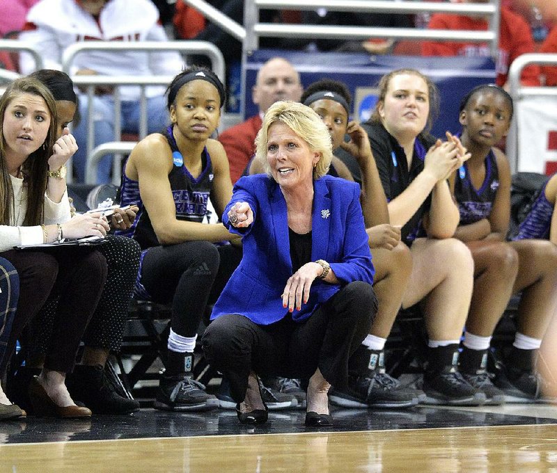 Central Arkansas head coach Sandra Rushing directs her team during the second half of a first-round women's college basketball game against Louisville in the NCAA Tournament in Louisville, Ky., Friday, March 18, 2016. 