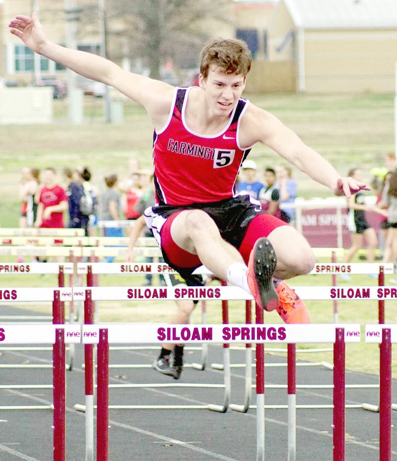 RANDY MOLL NWA MEDIA Farmington junior Jacob Gray placed sixth in the 110-meter hurdles to help the Cardinal boys track and field team to a second-place finish at the Panther Relays hosted by Siloam Springs Thursday.