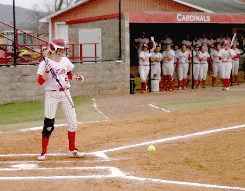 Photo by Mark Humphrey/Enterprise-Leader/Farmington junior Paige Devecsery watches a ground ball hit the dirt in front of her. Devecsery found a pitch she liked in the fourth inning, blasting a grand-slam homer against Siloam Springs in the Lady Cardinals 13-0 home win on March 6.