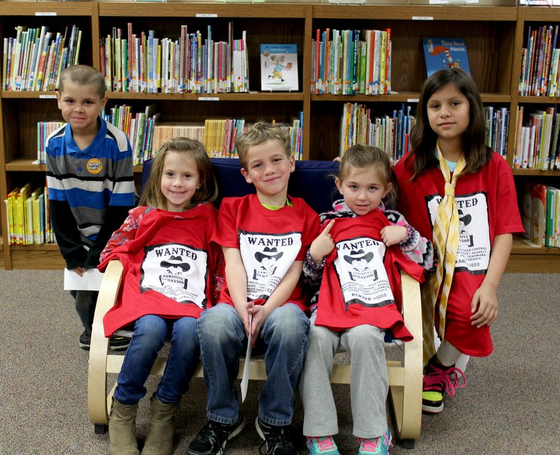 Submitted Photo &quot;Pawsitive&quot; and Wise Students for the month of March at Glenn Duffy Elementary School are Aaron Ortega (left), of Hiwasse, Kalia Dolney of Gravette, Jack Grimes of Sulphur Springs, Logan Hill of Decatur and Abriana Amezcua of Bella Vista. Troy Glover of Gravette was also a winner but was not present for the photo. March PAWS winners were recognized at the monthly Rise and Shine assembly and given certificates and T-shirts.