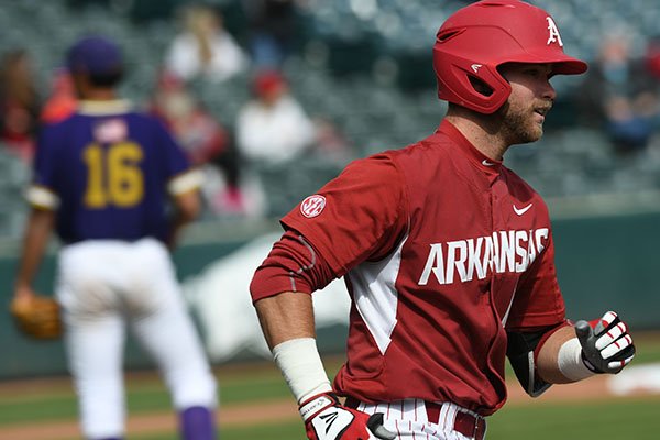 Arkansas' Luke Bonfield circles the bases after hitting a solo home run in the first inning of a game against Alcorn State on Wednesday, March 15, 2017, in Fayetteville. 