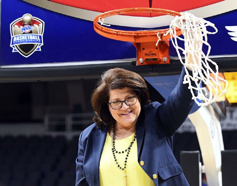 Coaches at mid-major women’s programs, such as Quinnipiac’s Tricia Fabbri (above), only hope they can draw a fi rst-round game on a neutral floor in the NCAA Women’s Tournament.