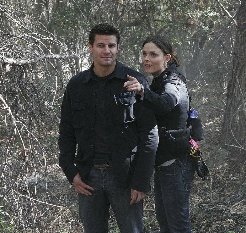 David Boreanaz and Emily Deschanel are shown in 2006 in a scene from the second season of Bones. The long-running series comes to an end at 8 p.m. March 28 on Fox.
