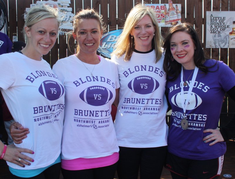 Leeanna Shadlow (from left), Nicole Olson, Caroline Rochelle and Toni Bahn gather after the 2016 Blondes vs. Brunettes charity football game benefitting the Alzheimer's Association. Kickoff for this year's event is 1p.m. April 1 at Champions Stadium, on the campus of Cross Church Springdale.