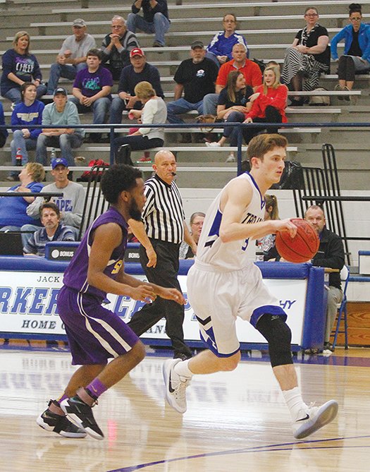 Terrance Armstard/News-Times Parkers Chapel guard Bryce Coke leads a fast break during the Trojans' game against Sparkman this past season. Coke was one of six Union County standouts to earn postseason accolades by the Arkansas Activities Association.