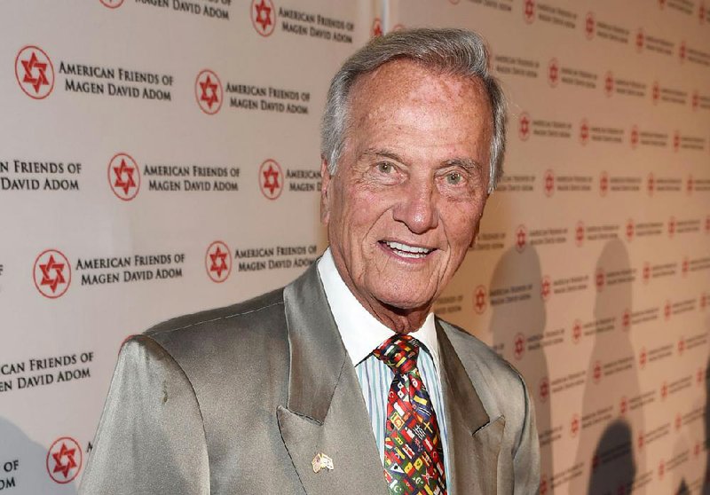 In this 2014 file photo Pat Boone attends American Friends of Magen David Adom's Red Star Ball held at The Beverly Hilton in Beverly Hills, Calif.