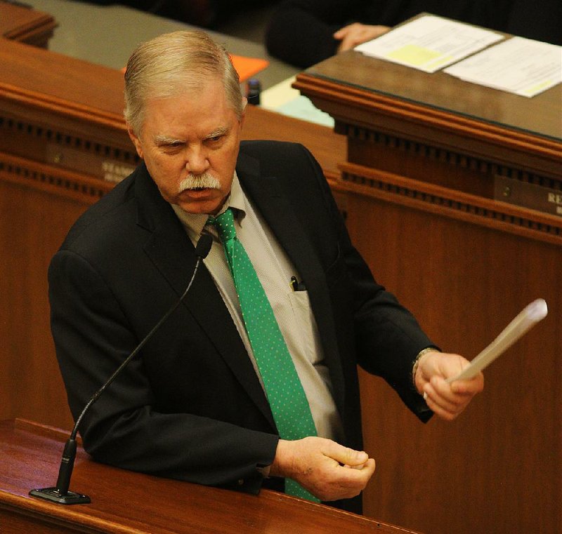 Rep. Dan Douglas, R-Bentonville, talks about House Bill 1725 before it failed Friday in the House. Douglas said he would pull the bill that would have revamped the Agriculture Department.
