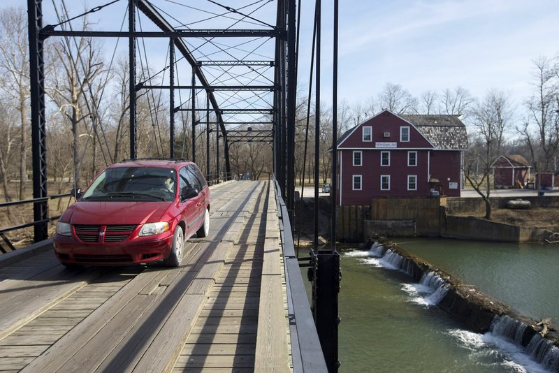 A vehicle crosses the War Eagle bridge Friday, Feb. 10, 2017, in Rogers.