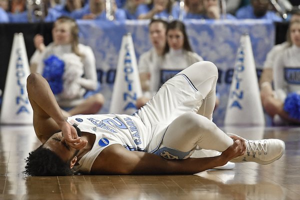 North Carolina's Joel Berry II (2) reacts after being injured during the second half against Texas Southernin a first-round game of the NCAA men's college basketball tournament in Greenville, S.C., Friday, March 17, 2017. (AP Photo/Rainier Ehrhardt)