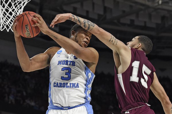 North Carolina's Kennedy Meeks (3) grabs a rebound against Texas Southern's Stephan Bennett (15) during the second half in a first-round game of the NCAA men's college basketball tournament in Greenville, S.C., Friday, March 17, 2017. (AP Photo/Rainier Ehrhardt)