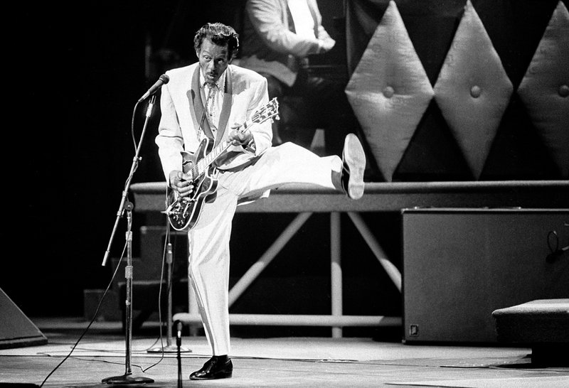 FILE - In this Oct. 17, 1986 file photo, Chuck Berry performs during a concert celebration for his 60th birthday at the Fox Theatre in St. Louis, Mo. On Saturday, March 18, 2017, police in Missouri said Berry has died at the age of 90. (AP Photo/James A. Finley)