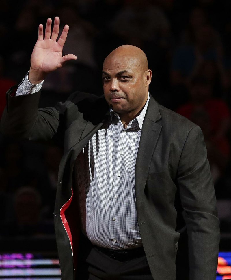Basketball studio analyst Charles Barkley donned a Kent State uniform over his shirt and tie in hopes the Golden
Flashes could beat first-round foe UCLA. It didn’t work.