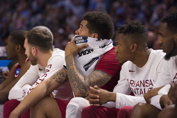 Arkansas' bench watches the action during the final minutes against North Carolina Sunday March 19, 2017 during the second round of the NCAA Tournament at the Bon Secours Wellness Arena in Greenville, South Carolina. The Tar Heels beat the Razorbacks 72-65 eliminating them from the tournament.