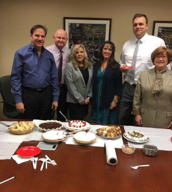 Submitted photo Morgan Stanley celebrated Pie/Pi Day with a homemade pie contest, with entries by its employees. Winners were Denise Franks, raspberry cream; Tina Smooth Donoho, grapefruit pie; and Dennis Berry, apple pie. From left are Brad Hudgens, judge, Robbie Walker, Debby Butler, Tina Smooth Donoho, Landon Trusty and Susan Siegel.