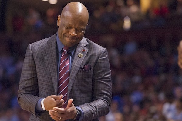 Arkansas head coach Mike Anderson pounds his fist during the second half against North Carolina Sunday March 19, 2017 during the second round of the NCAA Tournament at the Bon Secours Wellness Arena in Greenville, South Carolina. The Tar Heels beat the Razorbacks 72-65 eliminating them from the tournament.