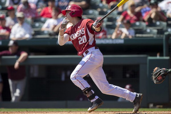 Arkansas's Carson Shaddy connects on a pitch Sunday, March 19, 2017, against Mississippi State at Baum Stadium in Fayetteville.