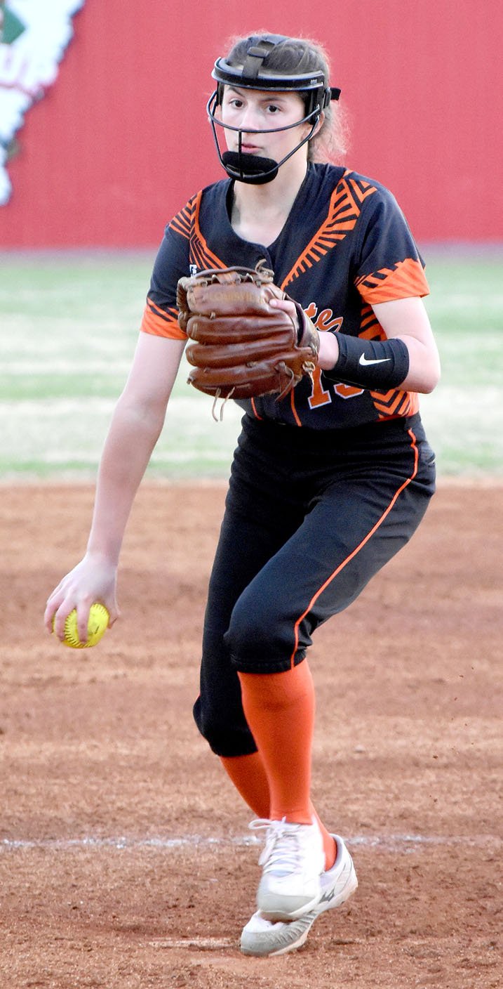 Photo by Mike Capshaw Gravette freshman Cally Kildow delivers a pitch Saturday during the Lady Lions&#xe2;&#x20ac;&#x2122; 6-2 win against Bentonville West in the semifinals of the Farmington/Fayetteville Invitational. Kildow struck out 13 in the game.