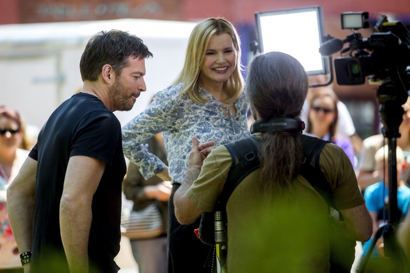 Harry Connick, Jr., and Geena Davis work with a film crew last year on the downtown square during the Bentonville Film Festival.