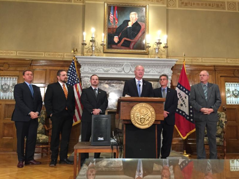 Gov. Asa Hutchinson speaks Wednesday at a news conference announcing he has signed HB1249.