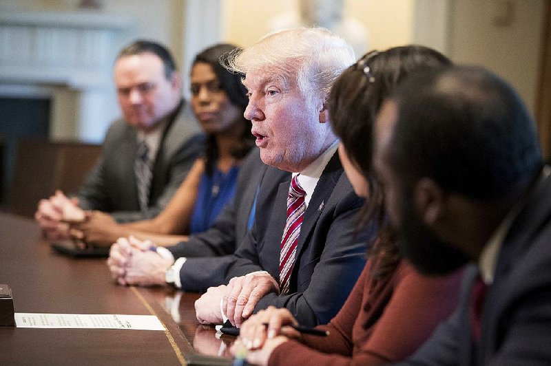 President Donald Trump meets with members of the Congressional Black Caucus on Wednesday at the White House. 